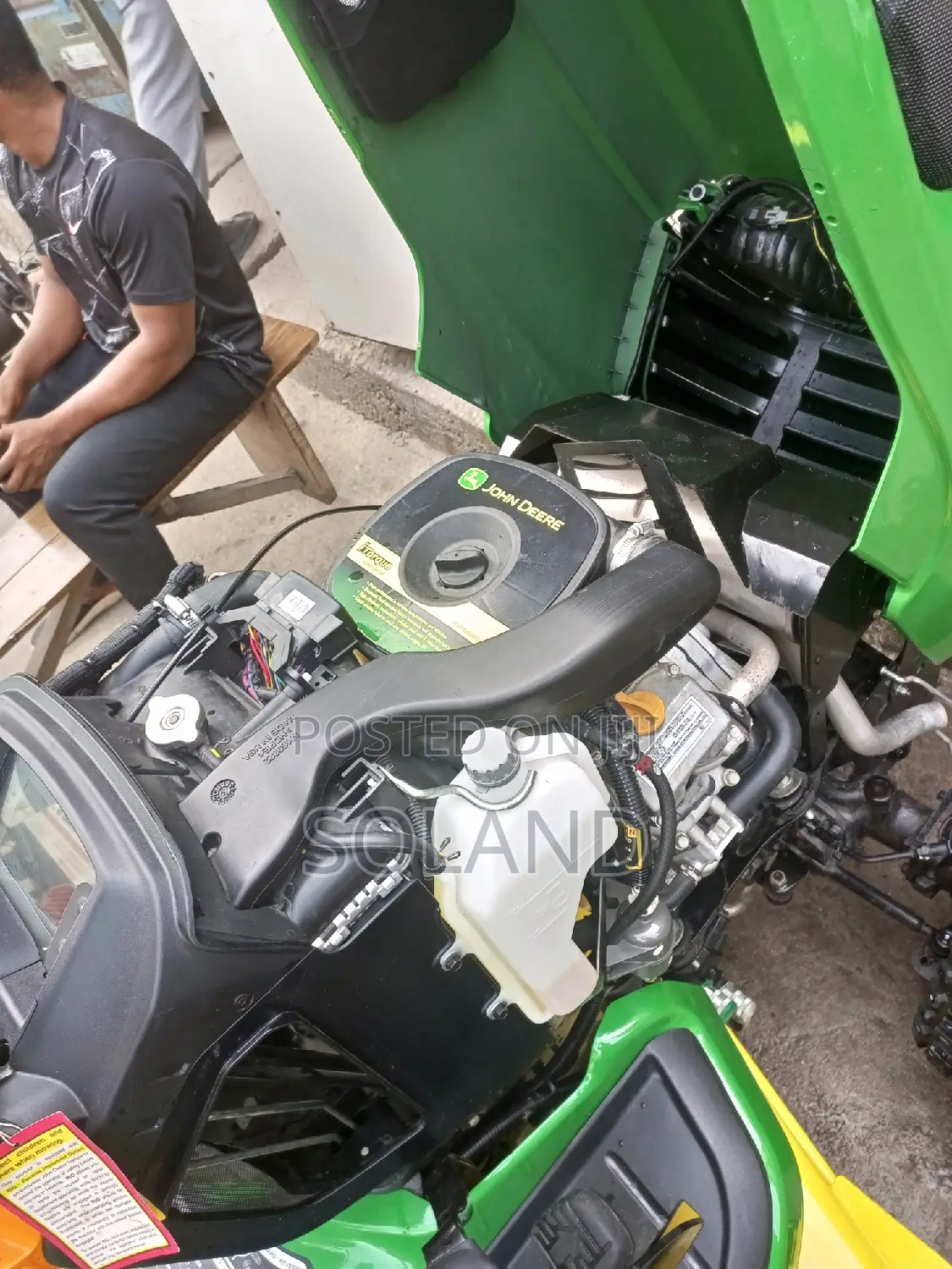 Driving Lawnmower