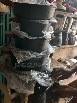Granite Pot With Fry Pan and Spoons