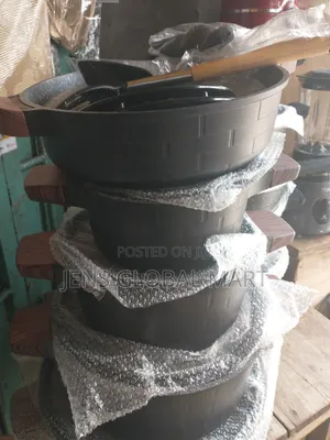 Granite Pot With Fry Pan and Spoons