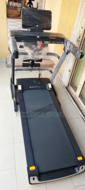 Photo - 4 Hp Commercial Treadmill With Massages Gravity Fitness
