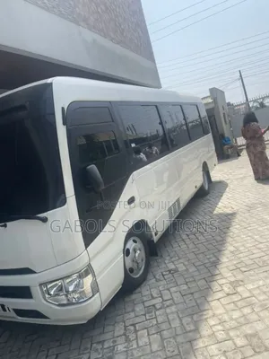 Photo - New Toyota Coaster 2023 White