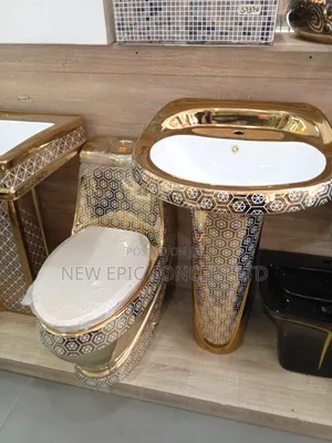 Gold and White Water Closet