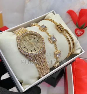 Rolex Female Gold Stoned Watch and Bracelet