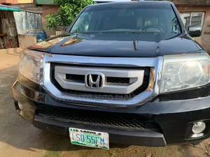 Photo - Honda Pilot Touring 4dr SUV (3.5L 6cyl 5A) 2009 Black