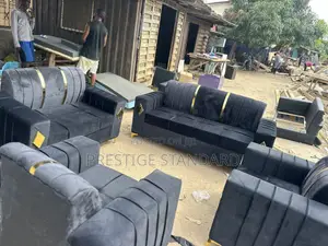 A Complete Black Set of Sofa