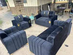 A Complete Black Set of Sofa