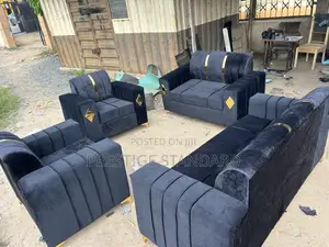 A Complete Black Set of Sofa
