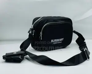 Photo - Original Burberry Black Side Bag Is Available in Store Now
