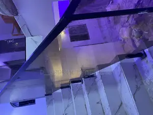 Golden Frameless Glass Staircase
