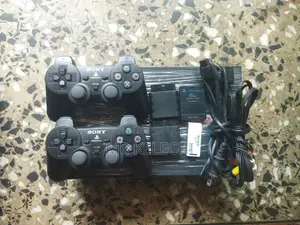Clean Uk Used Playstation 2 With Two Wireless Pads and 40 Games. (Ps2)