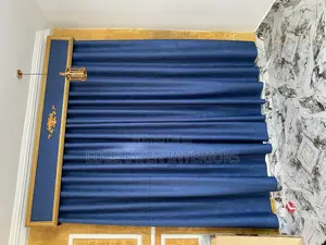 Blue Stock Curtain With Gold Board