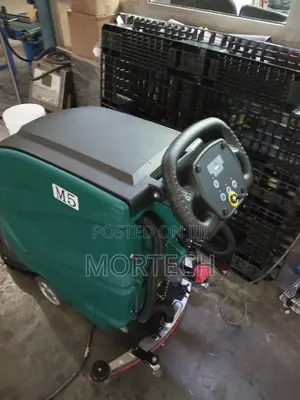 M5 Auto Scrubber and Dryer Wall Behind Machine