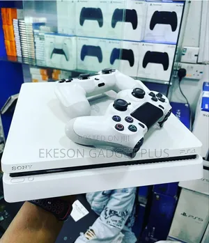 Neatly Used Playstation 4 Slim With 2 Pads and 12games Fc26