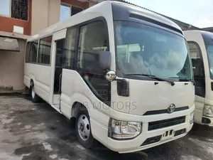 Photo - New Toyota Coaster 2023 White