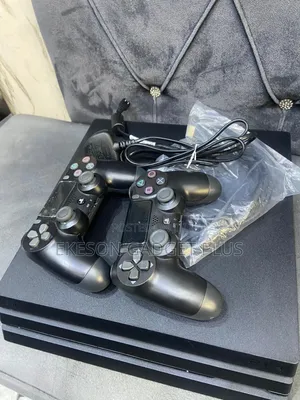 Neatly Used Ps4 Pro Console With Controllers