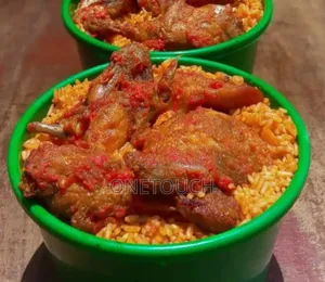 2litres of Party Jollof Rice With 2 Turkey and Hake Fish