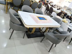 Six Seaters Dining Table and Chairs