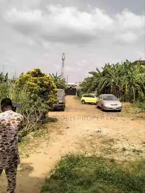 2plots With Structure Along the Major Rd at Idimu Orisunbare