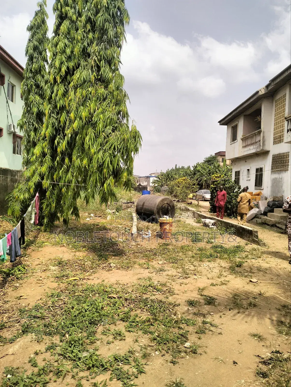 2plots With Structure Along the Major Rd at Idimu Orisunbare