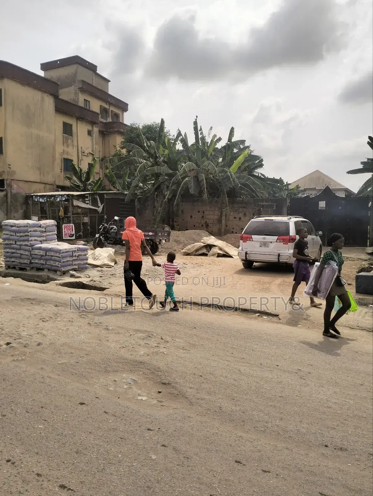 2plots With Structure Along the Major Rd at Idimu Orisunbare