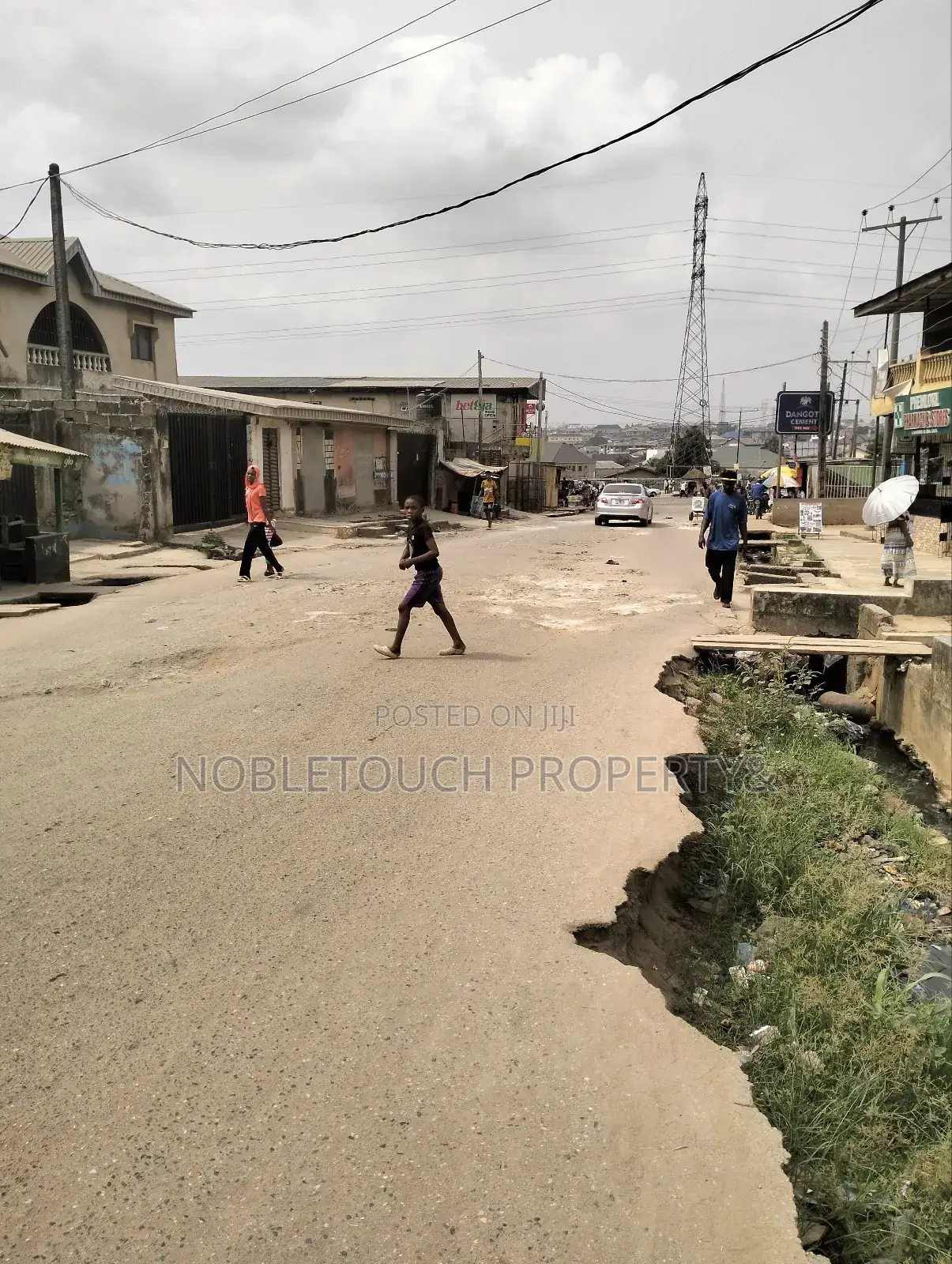 2plots With Structure Along the Major Rd at Idimu Orisunbare