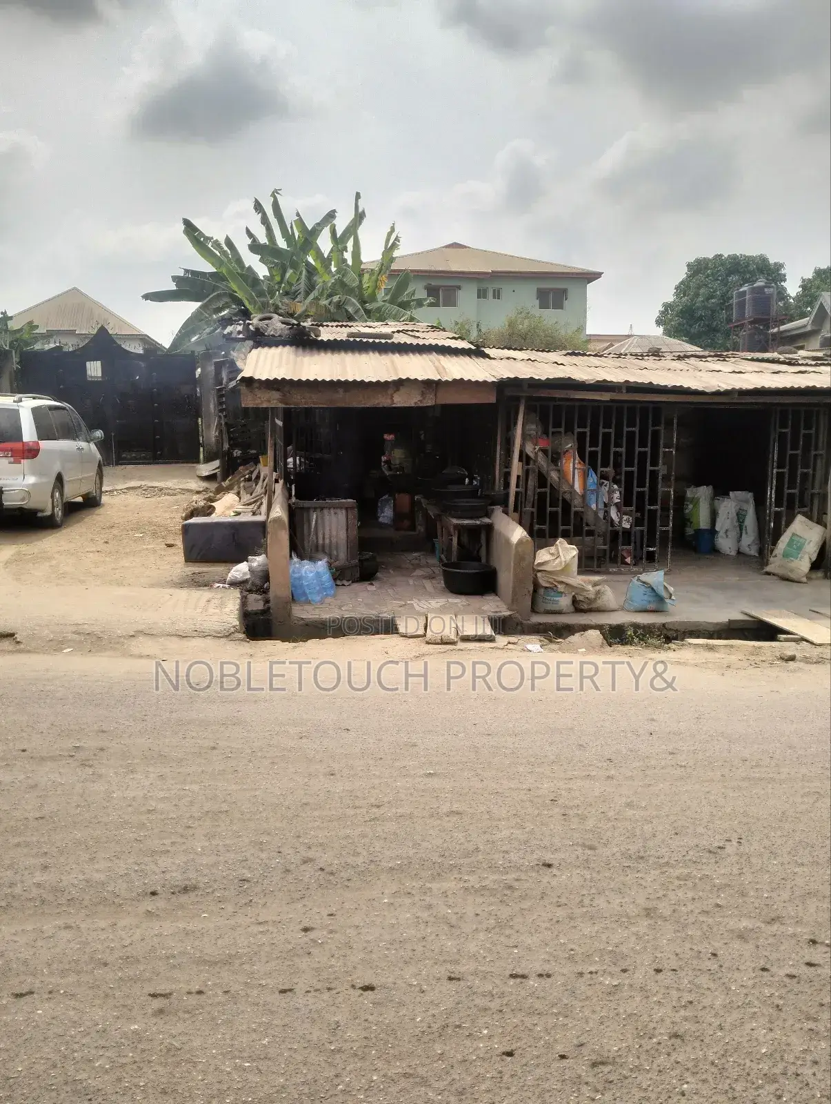 2plots With Structure Along the Major Rd at Idimu Orisunbare