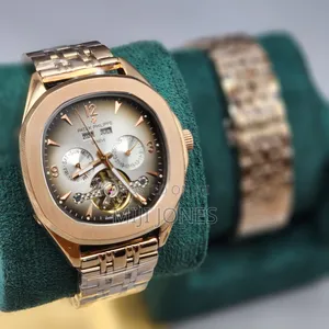 Photo - PATEK Day Date Year Watch White Dial