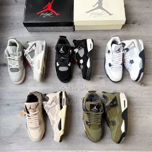 Photo - Original Air Jordan 4 Retro Sneakers