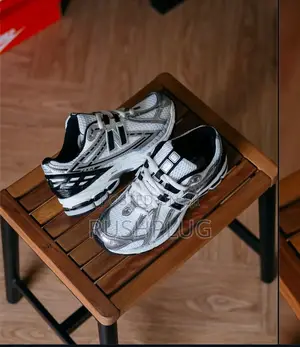 Photo - New Balance 1906R “Silver White Agate” Sneakers