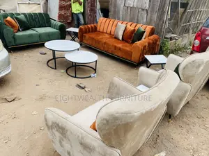 Channel Back Sofa With Center Table and Stools