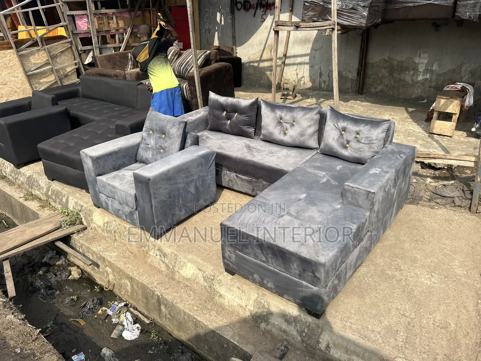 A Standard L Shape Grey Sofa