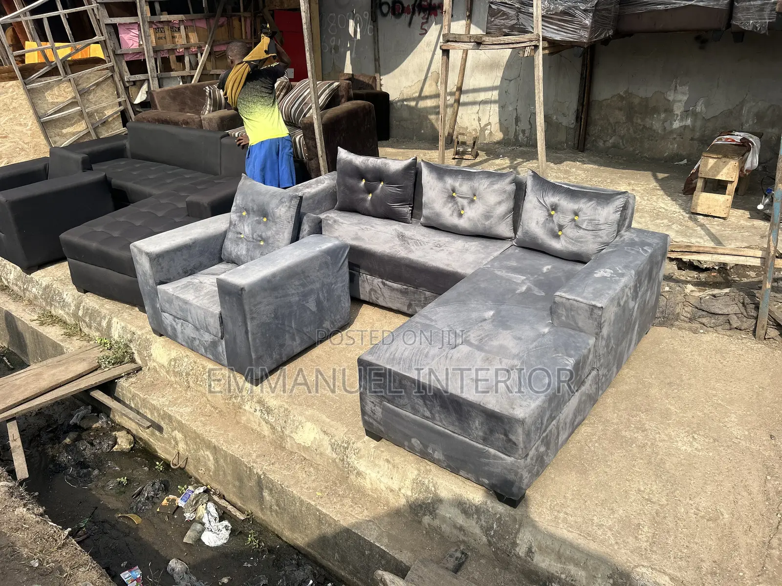A Standard L Shape Grey Sofa
