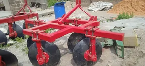 Photo - Disc Ridger Tractor Attachment