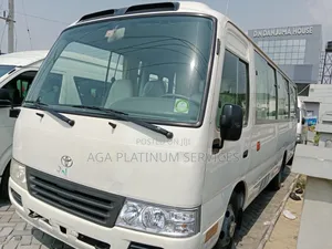 Photo - Toyota Coaster 2012 White