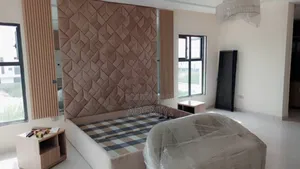 Bedframe ( Ulphostery) and Ottoman