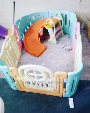 Coloured Fence For Nurseries With Small Curve Slides