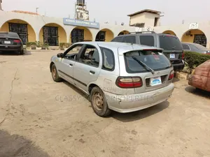 Photo - Nissan Almera 1998 Silver