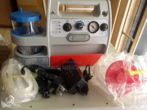 Portable Suction Machine With Battery Backup