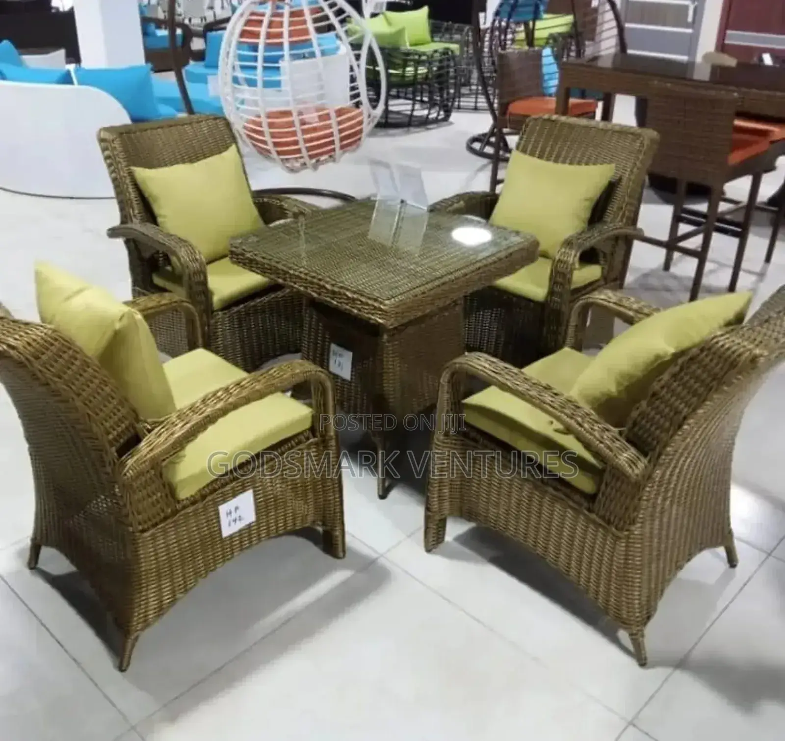 Exortic Rattan Set With 4 Chairs.