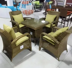 Exortic Rattan Set With 4 Chairs.