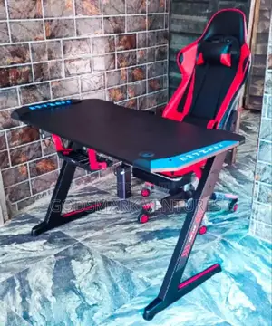 Imported Game Table and Swivel Game Chair With Lead Light.