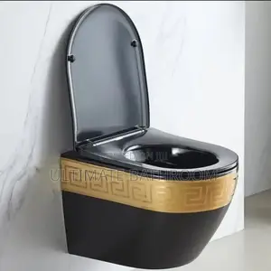 Gold and Black Wall Mounted Watercloset