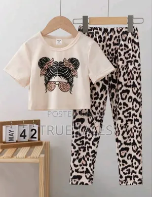Quality Girl's Cream Top and Animal Skin Brown Jeggings Set