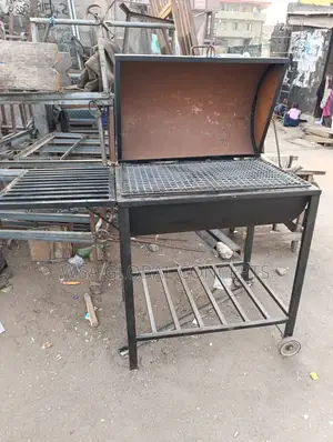 Large Barbecue and Chicken Stand With Tyres