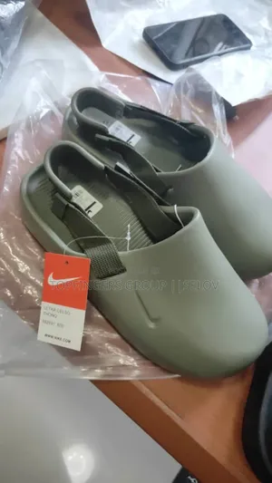 Photo - New Nike Authentic Clog Crocs. Black and Brown