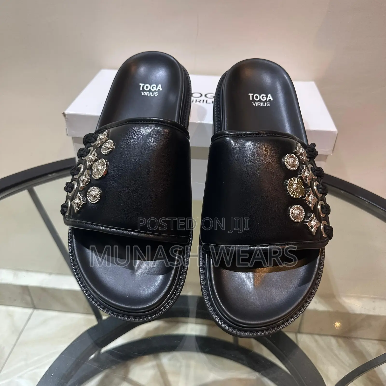 Toga Virilis Slide