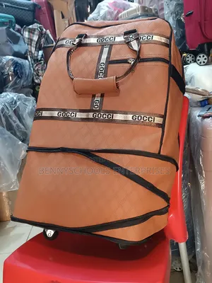Gucci Designed Leather Travelling Duffel Bag With Trolleys