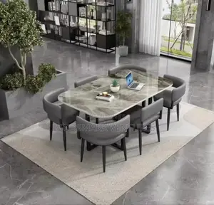 6 Seater Dining Table and Leather Seats in Grey Colour.