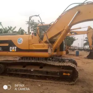Photo - 320bl Carterpillar Excavator