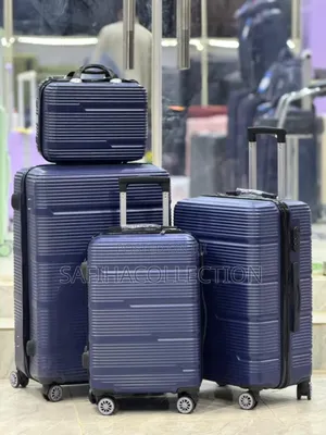 By 4 Plastic Luggages